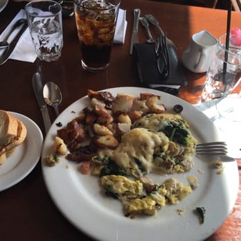 Dorn's Original Breakers Cafe - Harry scramble with country potatoes, sourdough toast and mimosa - Seafood Near Me - Morro Bay, California Dorn's Original Breakers Cafe - Harry scramble with country potatoes, sourdough toast and mimosa - Seafood Near Me - Morro Bay, California