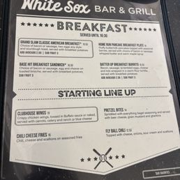 Menu - Menu from White Sox Bar & Grill in Chicago offering breakfast items like Grand Slam and Base Hit Sandwich, along with starters such as chicken wings and chili cheese fries.