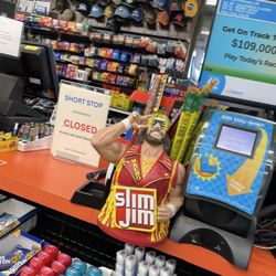Shortstop Mini Mart & Gas - Can I have this macho man Randy savage slim Jim container