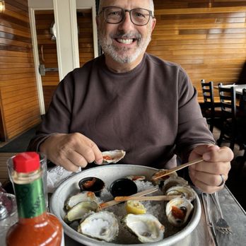 Benjamin's Raw Bar - Hubs enjoying his Oysters - Seafood Near Me - Newport, Rhode Island