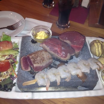 The Brewers Arms - Food cooks right on the hot stone. Venison, Kangaroo, Lamp and shrimp. I also recommend the buttery garlic sauce!! - Wine Bars Near Me - Christchurch, CAN The Brewers Arms - Food cooks right on the hot stone. Venison, Kangaroo, Lamp and shrimp. I also recommend the buttery garlic sauce!! - Wine Bars Near Me - Christchurch, CAN