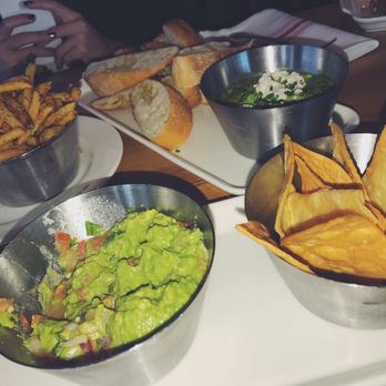 Earls Kitchen + Bar - Guacamole + Chips, Truffle Fries, and Warm Spinach + Three Cheese Dip. - New American Near Me - Miami, Florida
