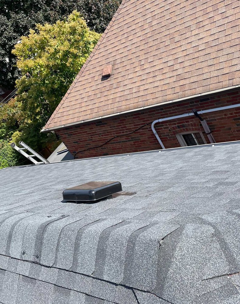 Slide of Hunterwood Roofing