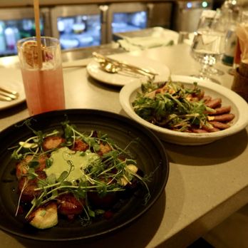 Khâluna - Green Curry & Scallop (left) | Duck Laab (right) - Laotian Near Me - Minneapolis, Minnesota Khâluna - Green Curry & Scallop (left) | Duck Laab (right) - Laotian Near Me - Minneapolis, Minnesota