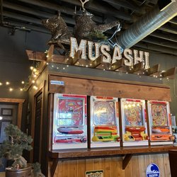 Musashi Sushi Bar & Japanese Cuisine - I hear these Pachinko games work when powered up?