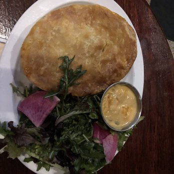 Brit's Pub - Chicken Pot pie (with extra sauce!) with a little salad - Pubs Near Me - Minneapolis, Minnesota Brit's Pub - Chicken Pot pie (with extra sauce!) with a little salad - Pubs Near Me - Minneapolis, Minnesota