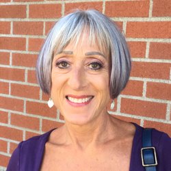 MayDay Hair Art Studio - We used Youngblood mineral makeup, shades of plum, emphasizing her her eyes. Camera ready