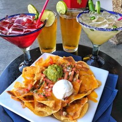 Jose's Mexican Food - Nachos with a pomegranate margarita and a jalapeño margarita