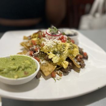 RJ Skillets - Chilaquiles with Steak - Mexican Near Me - Portland, Oregon RJ Skillets - Chilaquiles with Steak - Mexican Near Me - Portland, Oregon