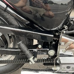 Riders Harley-Davidson - Oil sprayed all over bike because they overfilled the tank.