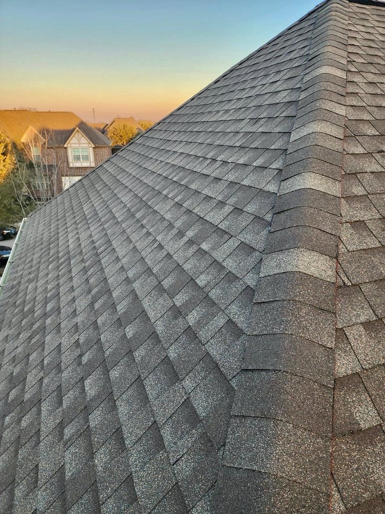 Metal roofing installation on a Friendswood home, highlighting coastal durability