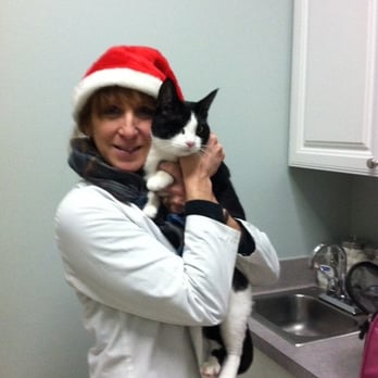 Hidden Brook Veterinary Services - Dr. Slaughter and the rescued cat Smudge who came to visit during our Christmas with Santa 2014. - Veterinarians Near Me - Dartmouth, Massachusetts