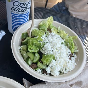 CAVA - Salad with romaine, cucumber, feta, half steak and half chicken - Salad Near Me - Greensboro, North Carolina