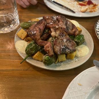 Mesón de Cervantes - Pork chops and shishito peppers - Spanish Near Me - Málaga, Massachusetts Mesón de Cervantes - Pork chops and shishito peppers - Spanish Near Me - Málaga, Massachusetts