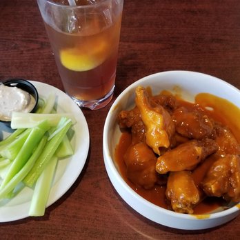 Wings and Rings - Buffalo Wings and Rings Traditional Hot Buffalo Wings with homemade blue cheese dressing and celery. - Chicken Wings Near Me - Chicago, Illinois