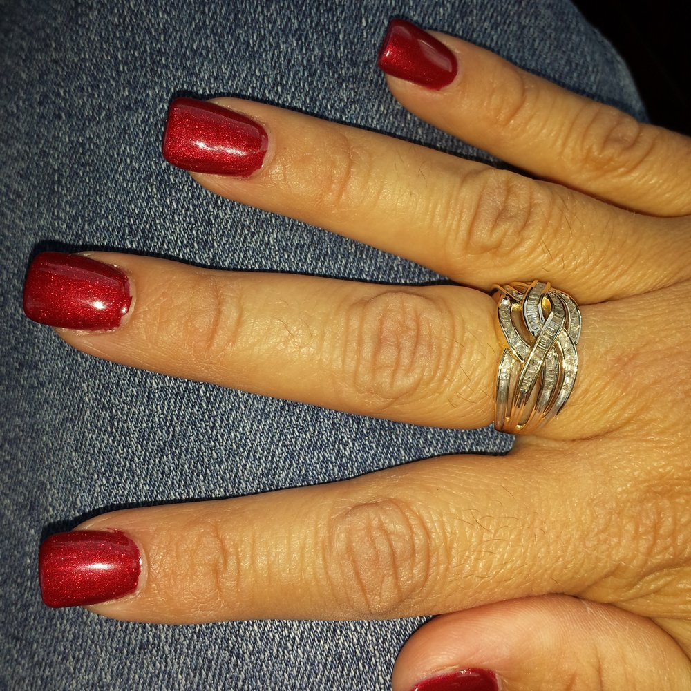 Nails MAXX & Spa - Right hand, middle finger missing polish on both sides above cuticle. - Nail Salons Near Me - Lawton, Oklahoma