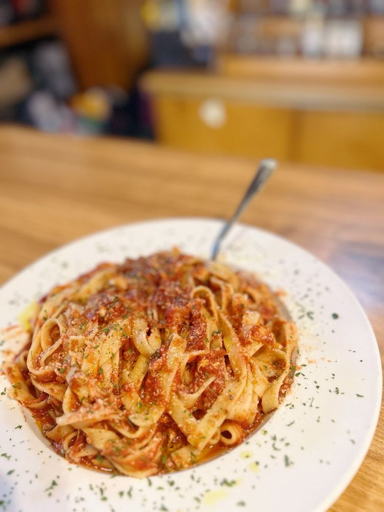 Carmine’s Pizza & Pasta Logo