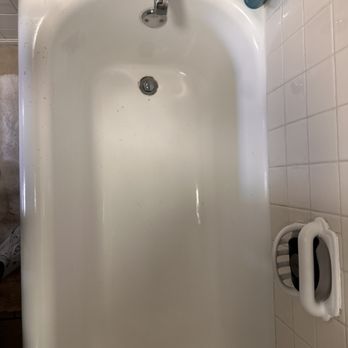 A Touch Glazing - Before with chips near the faucet and drain - Refinishing Services Near Me
