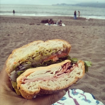 Lou's Cafe - Smoked ham & turkey with American cheese and Lou's Jalapeno sauce on 9-grain bread out in Baker Beach! - Coffee & Tea Near Me - San Francisco, California