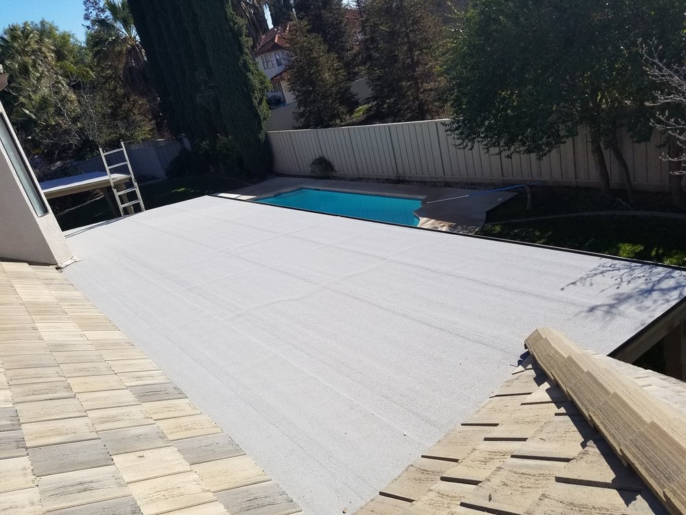 Slide of Landeros Roofing Solutions