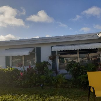 JVR Impact Windows & Doors - Old windows w old clamshell shutters, yuk! - Windows Installation Near Me - Oakland Park, Florida JVR Impact Windows & Doors - Old windows w old clamshell shutters, yuk! - Windows Installation Near Me - Oakland Park, Florida