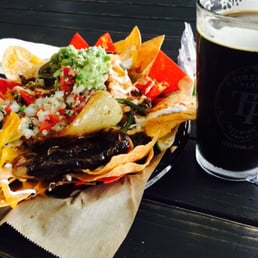 My yummy nachos and my beer!! My yummy nachos and my beer!!