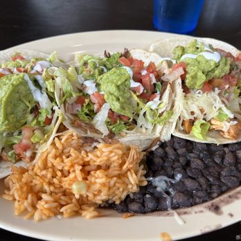 Lime - An American Cantina - Beef barbacoa taco (middle). Chicken tinga tacos (left and right) - Mexican Near Me - Winter Park, Colorado Lime - An American Cantina - Beef barbacoa taco (middle). Chicken tinga tacos (left and right) - Mexican Near Me - Winter Park, Colorado