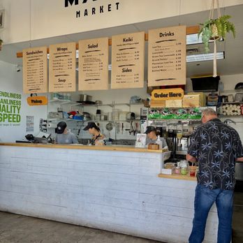 Māla Market - Simple order and pickup counter. If they're not too busy your sandwich can be assembled, packed, and ready real fast. - Sandwiches Near Me - Honolulu, Hawaii