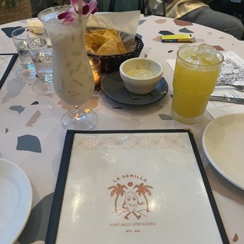 La Semilla - The wheel + a pineapple orange aguafresca - Latin American Near Me - Atlanta, Georgia La Semilla - The wheel + a pineapple orange aguafresca - Latin American Near Me - Atlanta, Georgia