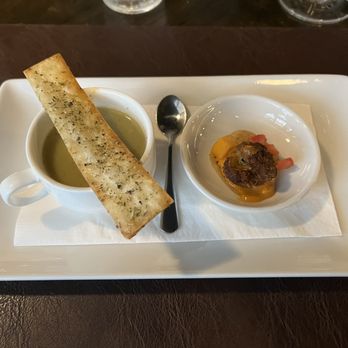 Sallie's Bistro - Amuse-bouche of cream of broccoli soup, tortilla with a beef meatball. - Belgian Near Me - Dunedin, Florida Sallie's Bistro - Amuse-bouche of cream of broccoli soup, tortilla with a beef meatball. - Belgian Near Me - Dunedin, Florida