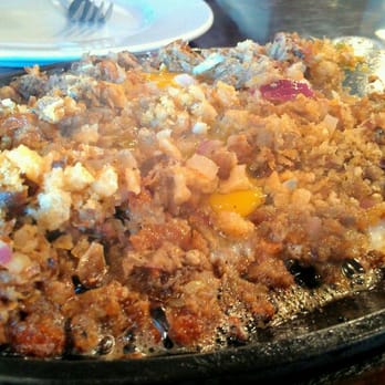 Gerry's Grill - Siiiizzling Sisig complete w/ fresh egg! :) - Filipino Near Me - Artesia, California Gerry's Grill - Siiiizzling Sisig complete w/ fresh egg! :) - Filipino Near Me - Artesia, California