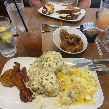 Ruby Slipper Orange Beach - Biscuits with gravy!!! The BEST ever!! Bloody Mary so spicy and yummy. Side of sweet hot chicken...que Bella!! We will be back again soon!! - Cafes Near Me - Orange Beach, Alabama