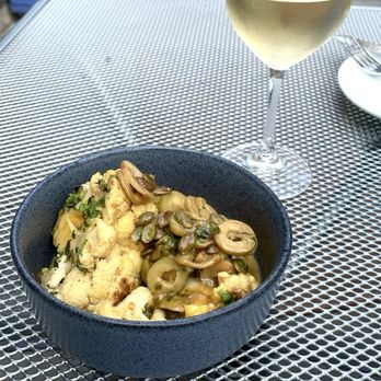 Pacífico - Roasted Cauliflower (part of pre fixe menu) with a glass of Pinot Grigio - Latin American Near Me - New Haven, Connecticut Pacífico - Roasted Cauliflower (part of pre fixe menu) with a glass of Pinot Grigio - Latin American Near Me - New Haven, Connecticut