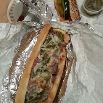 The Dogfather - 10" garlic cheesy bread ($6.95) and hotdog ($1.99. Tuesdays at $0.99) - Hot Dogs Near Me - Bartlett, Illinois The Dogfather - 10" garlic cheesy bread ($6.95) and hotdog ($1.99. Tuesdays at $0.99) - Hot Dogs Near Me - Bartlett, Illinois