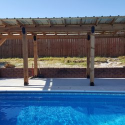 Higgins Contracting - A poolside pergola style patio cover we built in Sherman.