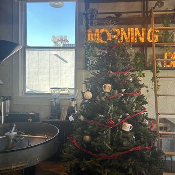 Better Buzz Coffee Hillcrest - Coffee roaster area with a season Christmas tree - Coffee & Tea Near Me - San Diego, California