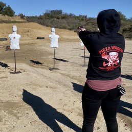 Wife shooting for the first time under the watchful eye of the RSO's.