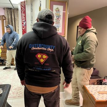 Outer County Construction - two men in a kitchen - General Contractors Near Me - Ronkonkoma, New York