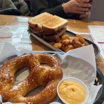 Sportsman’s Reloaded - Pretzel, sandwich, and cheese curds. - Pizza Near Me - New Glarus, Wisconsin Sportsman’s Reloaded - Pretzel, sandwich, and cheese curds. - Pizza Near Me - New Glarus, Wisconsin
