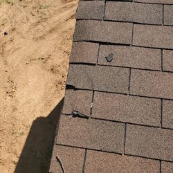 Marty Wright Home Sales - Silicone in 100 plus screw holes in the roof !
