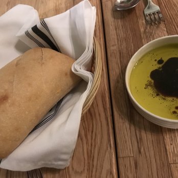 Mama - Birote Bread served with oil and vinegar at MAMA Oakland. - Italian Near Me - Oakland, California Mama - Birote Bread served with oil and vinegar at MAMA Oakland. - Italian Near Me - Oakland, California
