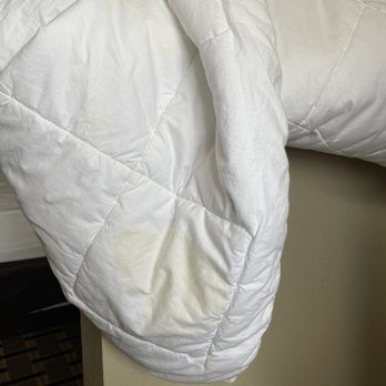 Quality Inn - Yellow stains all over the comforter we found draped over the half wall. - Hotels Near Me - Moore, Oklahoma