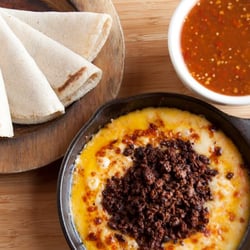 Palenque Grill - Choriqueso
Melted cheese with Mexican Chorizo