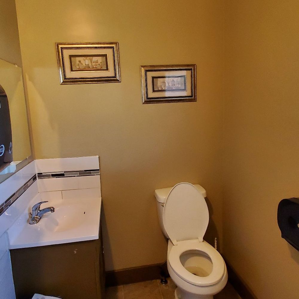 Erskine Grill - a small bathroom with a toilet and sink - Chicken Shop Near Me - Erskine, Alberta Erskine Grill - a small bathroom with a toilet and sink - Chicken Shop Near Me - Erskine, Alberta