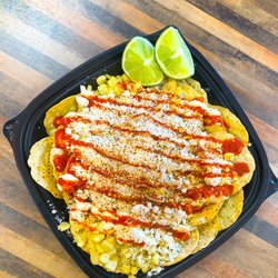 Tostielote - Corn, Mayonnaise, Cheese, Lime, Hot Sauce, and Tajin. Served with your choice of chips