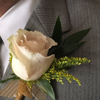 Spring Garden Florist - The rose is a bit wilty-looking on top, but the boutonnière is wrapped well and assembled beautifully. - Florists Near Me - Livermore, California