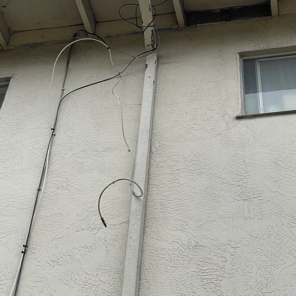 Slide of Maciel Roofing Construction