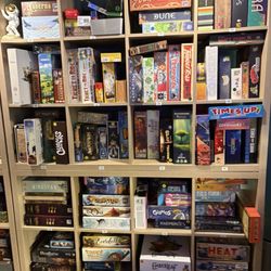 To The Table Board Game Cafe - Games for groups or solo players.