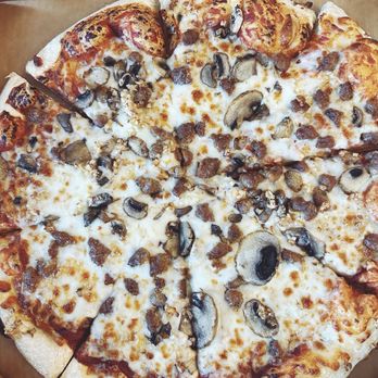 Pizza Hut - 3 topping pizza. Sausage, garlic and mushrooms. - Pizza Near Me - Madeira, Ohio Pizza Hut - 3 topping pizza. Sausage, garlic and mushrooms. - Pizza Near Me - Madeira, Ohio
