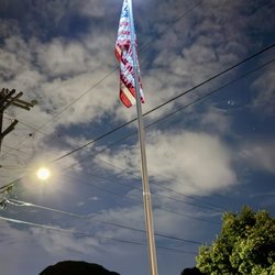 Burk Flagpole - The flagpole and American Flag lit at night. Long may she wave!